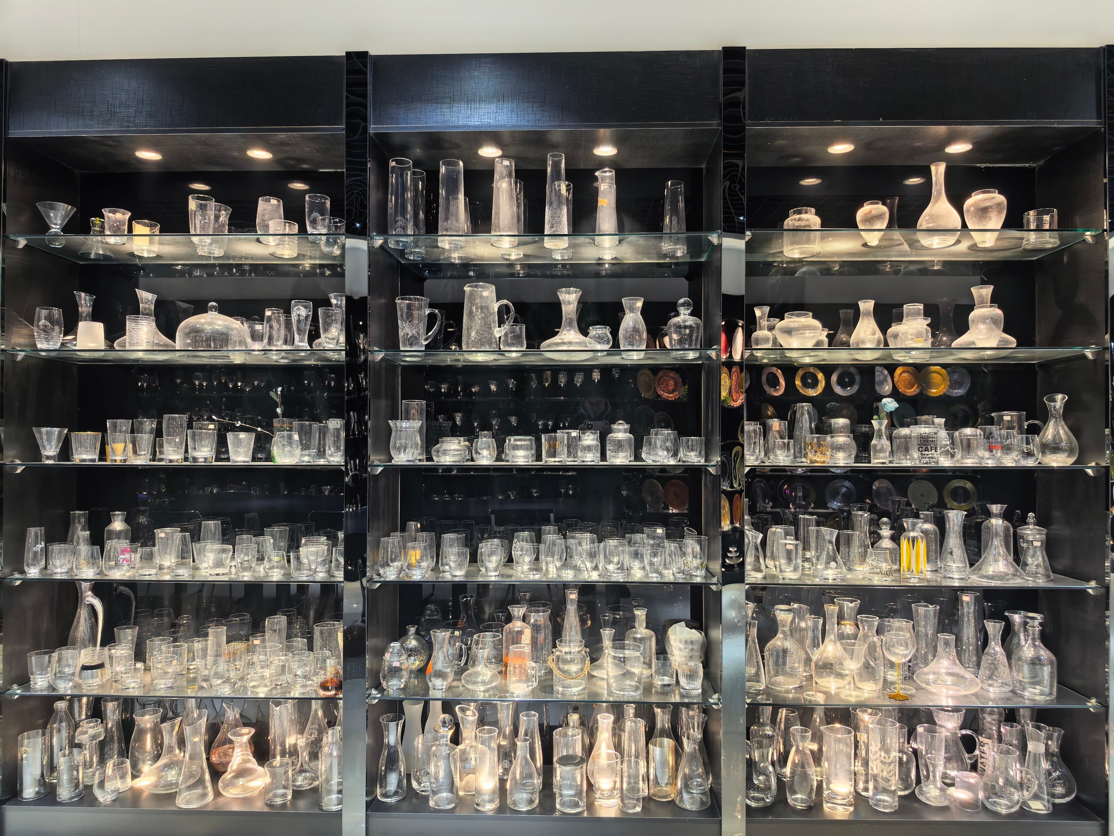 Tall glass vases, carafes, and specialty vessels